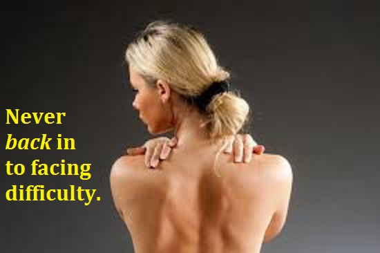 girl with back to mirror with words