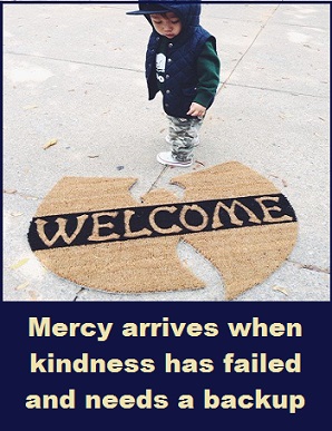 kid-on-welcome-mat-with-words